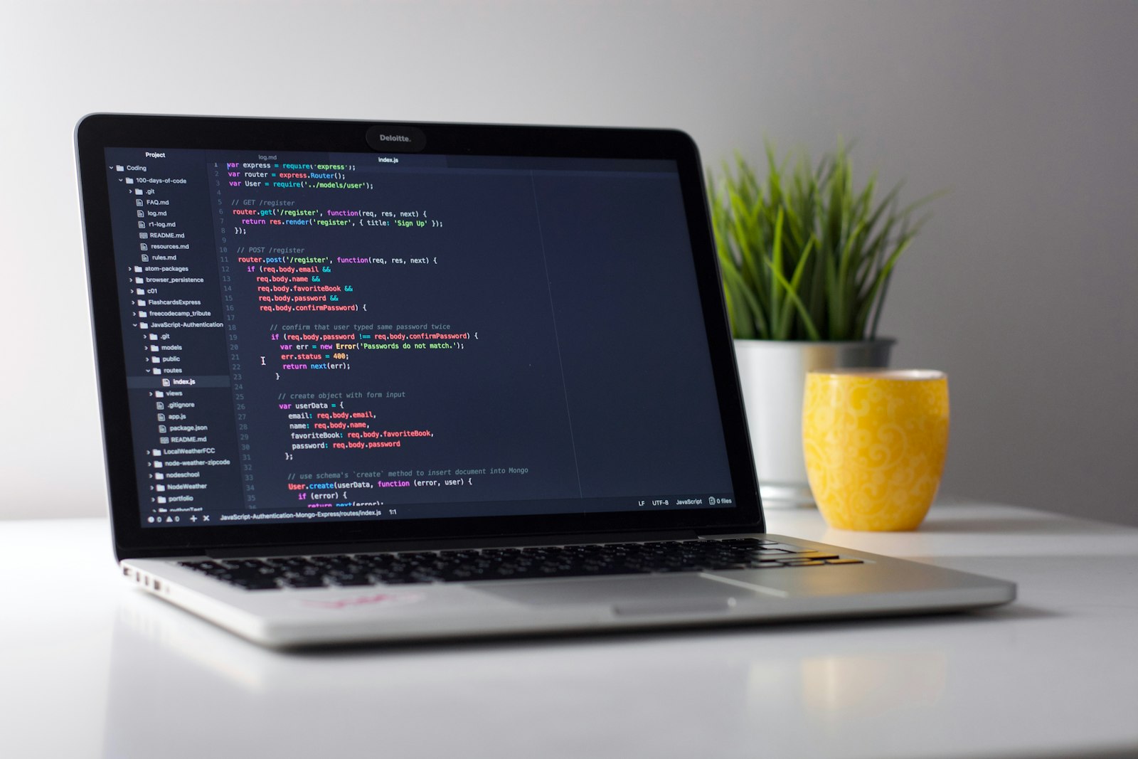 Developer workstation with code on screen